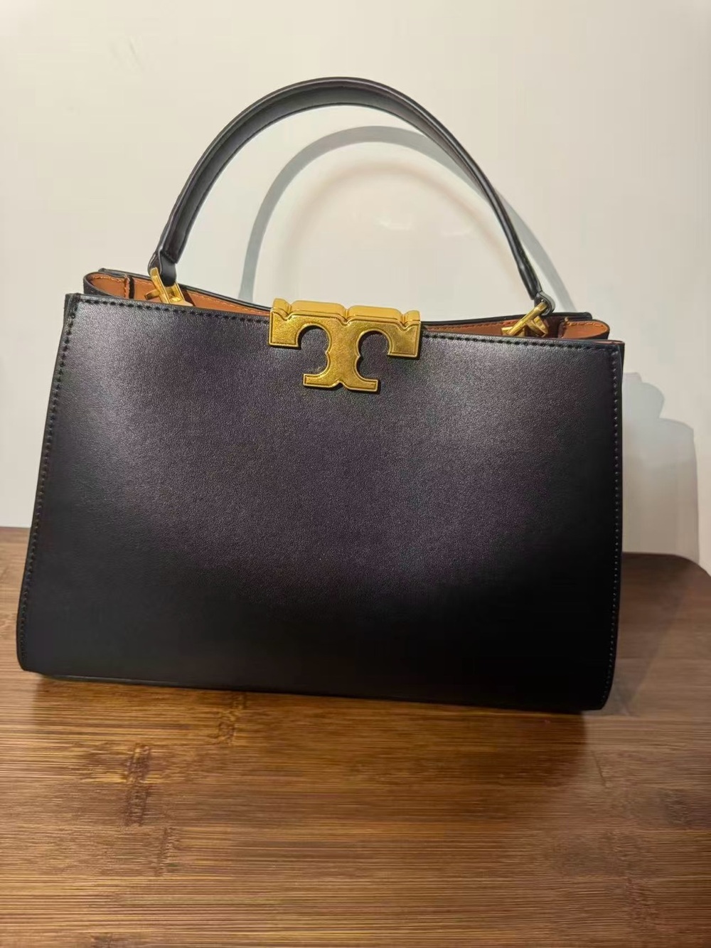 Black Leather Top-Handle Crossbody Bag with Gold Hardware